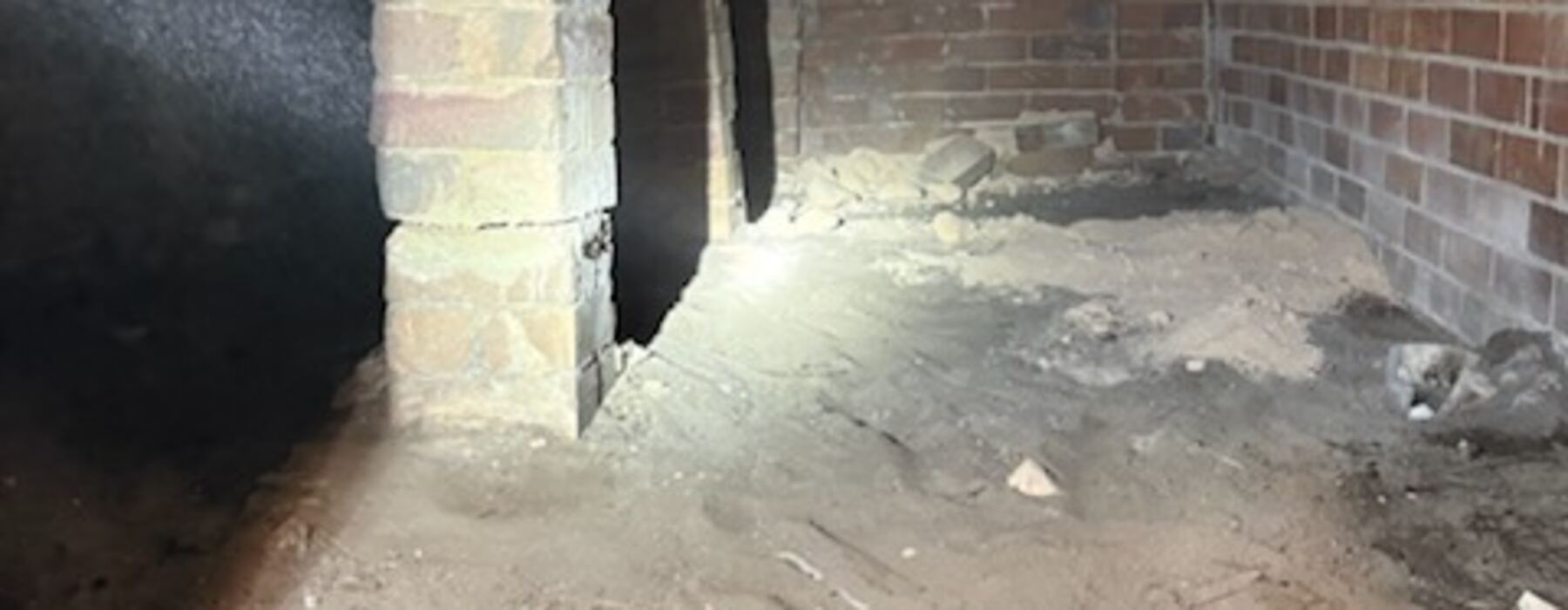 Empty, swept under-house space