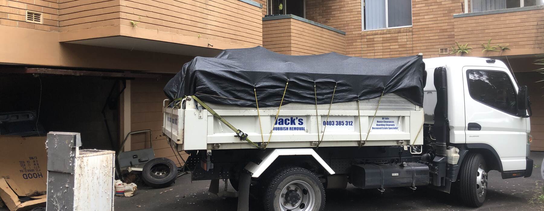Truck at a brick apartment block