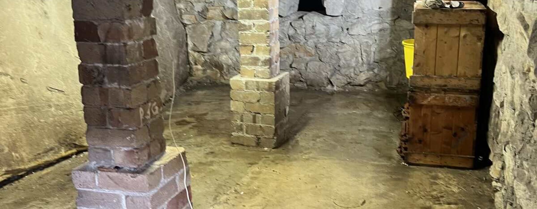 Under-house space cleared and swept