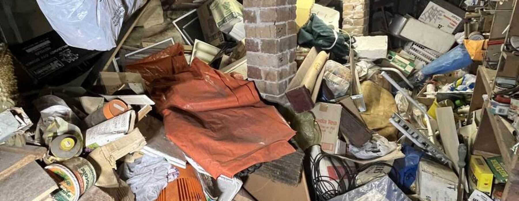 Packed under-house storage, before