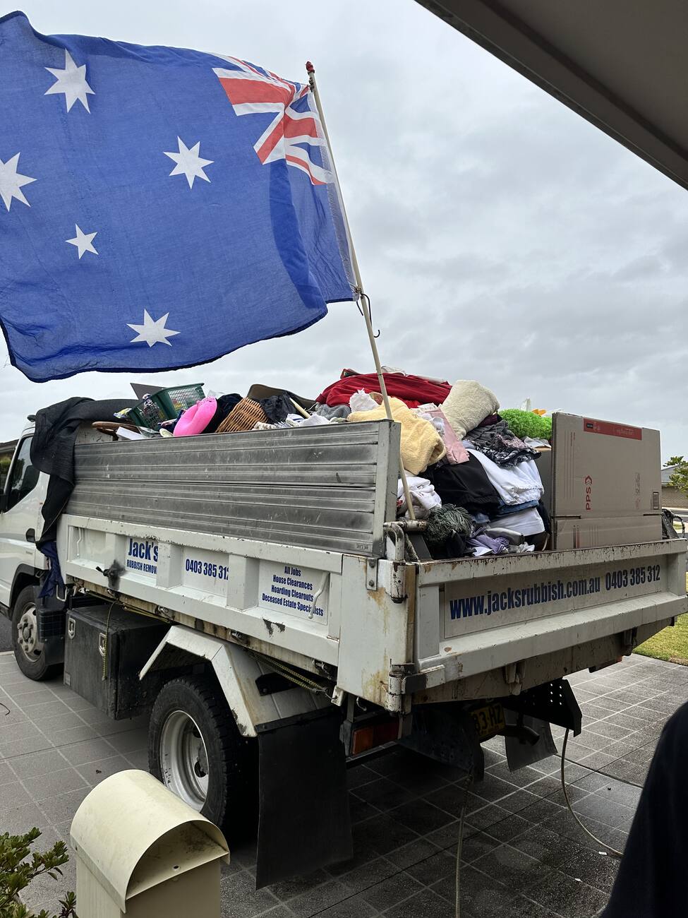 Jack's truck loaded with a full house clear-out, ready to haul away