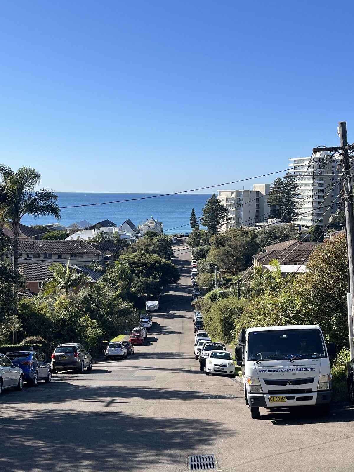A Jack's truck on a Northern Beaches street on the way to an estate clearance