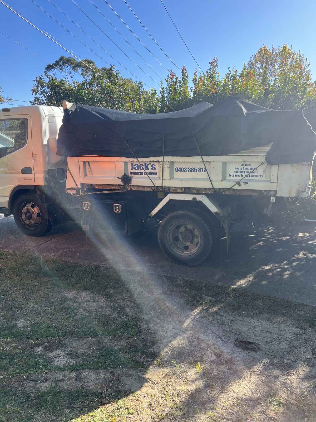 A Jack's truck loaded with builders waste on a Sydney job site